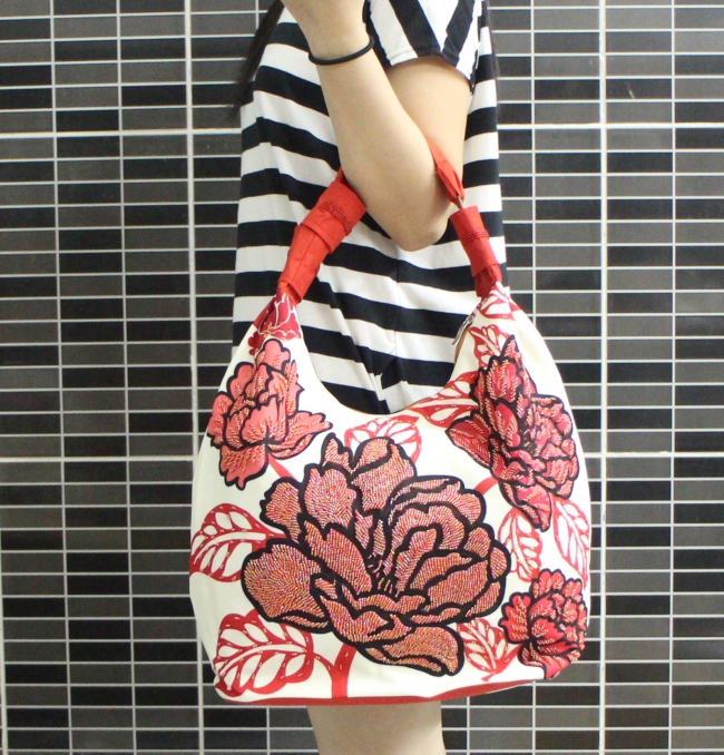 Beaded on printed rose handbag