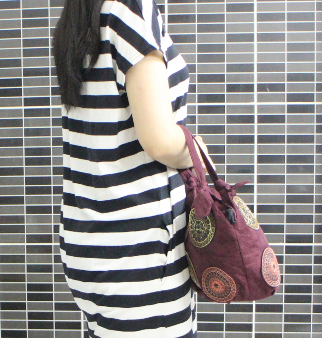 Embroidered synthetic suede handbag